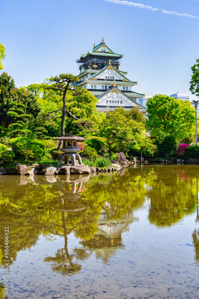 View with Osaka Castle, the most famous landmark and popular tourist attractions in Osaka, Japan. View with Osaka Castle, the most famous landmark and popular tourist attractions in Osaka, Japan.