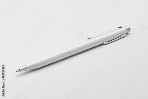 A Close-Up of a White Pen with a Silver Clip on a White Surface