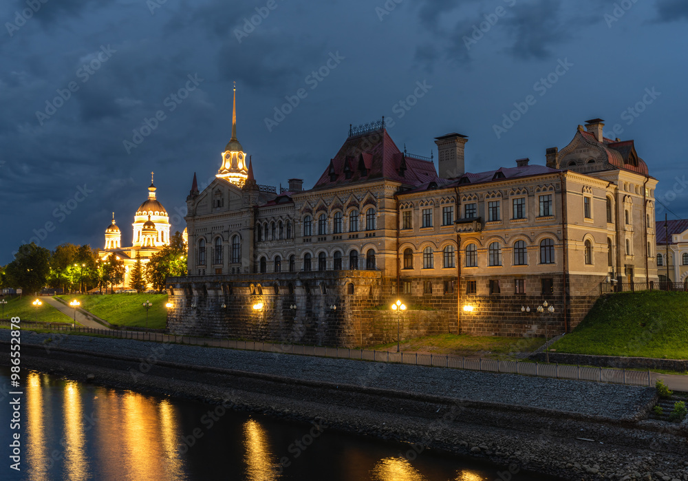 Naklejka premium night view of the old stock exchange and Spaso-Preobrazhenskiy kafedralniy sobor of Rybinsk