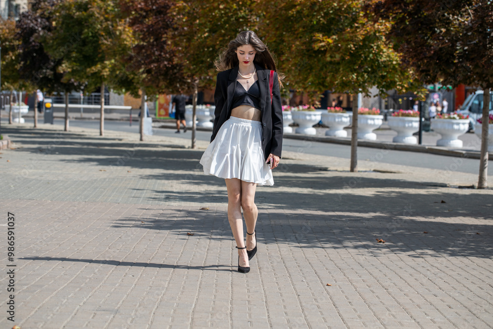 Full body portrait of a young beautiful brunette woman Full body portrait of a young beautiful brunette woman