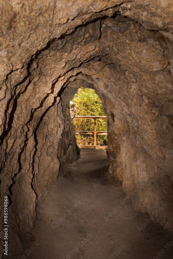 Fototapeta premium Interior of the cave that gives access to a viewpoint over the Castril River, on the Castril River Gorge trail, Granada.