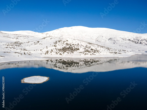 Winter view of Rila mountain near Belmeken Dam, Bulgaria photo