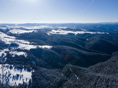 Winter view of Rila mountain near Belmeken Dam, Bulgaria photo