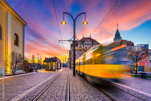 Oradea, Romania. Tram station in Union Square, beautiful city architecture in Crisana, Transylvania. photo