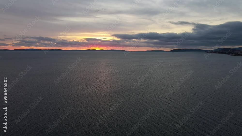 custom made wallpaper toronto digitalDrone footage of a peaceful sunset over the Adriatic Sea near Split, Croatia, showcasing the serene beauty of the ocean, distant islands, and the colorful sky.