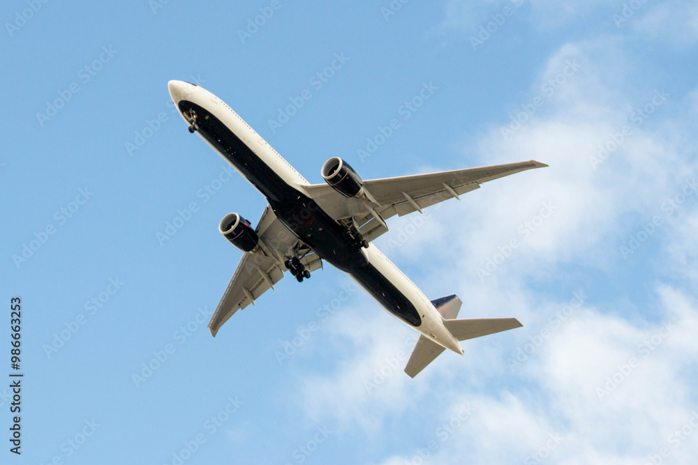 White passenger airplane flying in the sky amazing clouds in the background - Travel by air transport. High quality photo White passenger airplane flying in the sky amazing clouds in the background - Travel by air transport. High quality photo