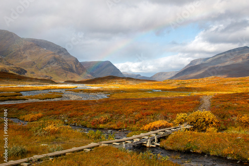 A wooden bridge at Kungsleden hiking trail near Salka, Lapland, Sweden