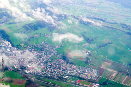 aerial drone shot panorama view of swiss village of Ziefen. aerial view of green fields landscape from drone, beautiful wineyards, wine grape agriculture. High quality photo photo