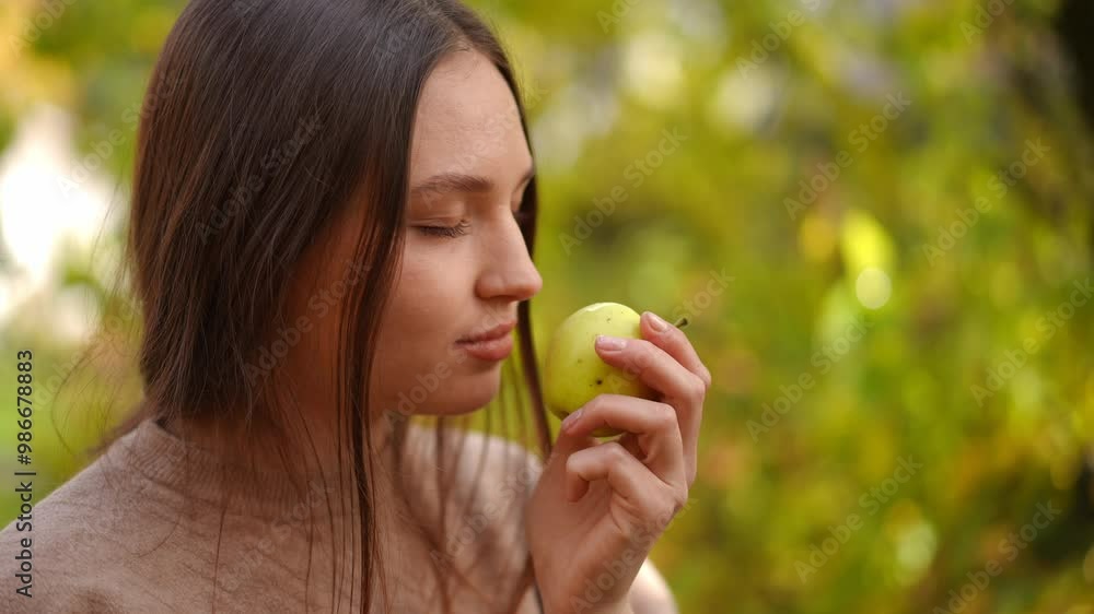 A beautiful, serene portrait of a young woman engaging with nature, showcasing her beauty and tranquility A beautiful, serene portrait of a young woman engaging with nature, showcasing her beauty and tranquility
