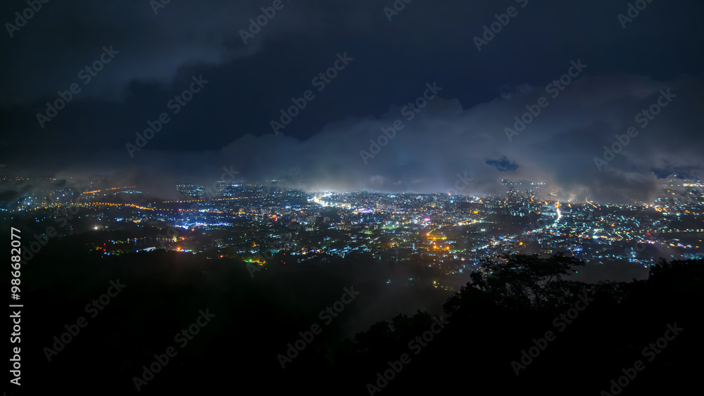 landscape aerial view City night light from Doi Suthep mountain view point on top of mountains with clouds, Chiang mai, Thailand landscape aerial view City night light from Doi Suthep mountain view point on top of mountains with clouds, Chiang mai, Thailand