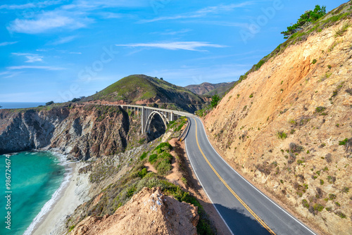 Beautiful scenery of Pacific Ocean coast along Highway 1 and Big Sur, wonderful aerial view of Bixby Bridge, sunset, sunrise, fog. Concept, travel, vacation, weekend