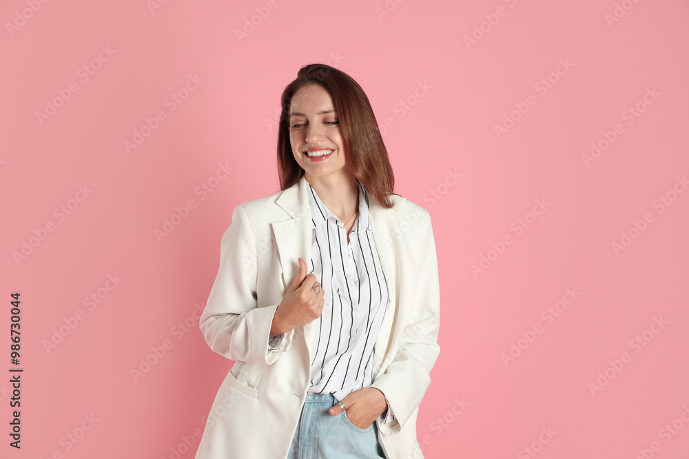 Beautiful woman in stylish white jacket on pink background Beautiful woman in stylish white jacket on pink background