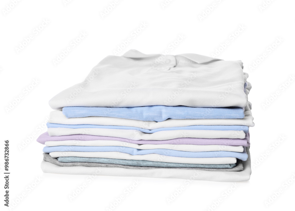 Stack of clean colorful t-shirts isolated on white Stack of clean colorful t-shirts isolated on white