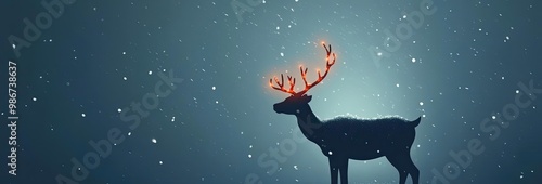 A majestic deer stands gracefully in falling snow, illuminated by soft light in a serene winter landscape.