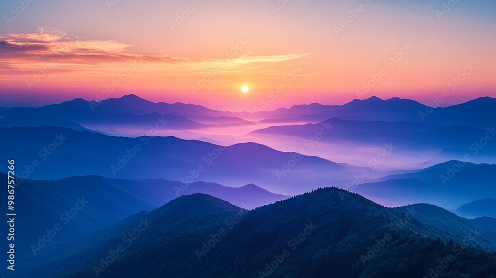 A Sunlit Horizon Over a Mountain Range with a Misty Valley A Sunlit Horizon Over a Mountain Range with a Misty Valley