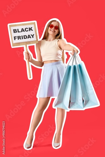Pretty young woman holding ...