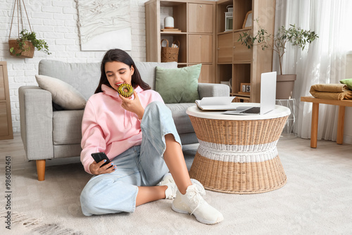 Beautiful young woman in st...