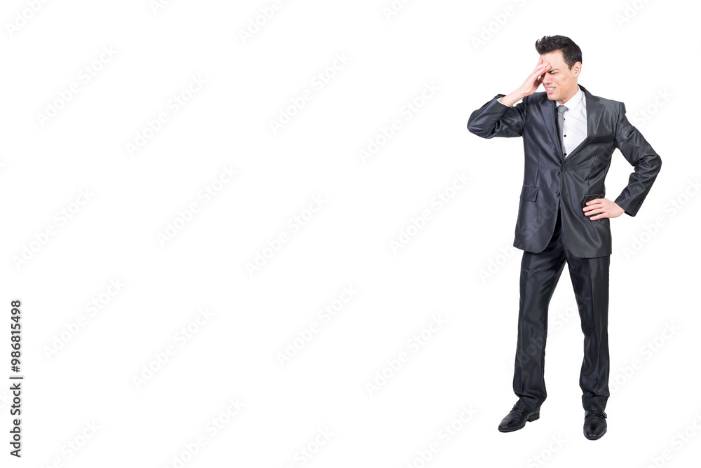 Man in suit suffering from headache. White background. Man in suit suffering from headache. White background.