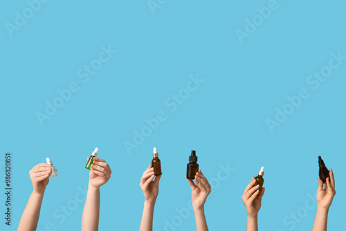 Hands holding various dropp...