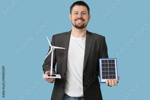 Young businessman with wind...