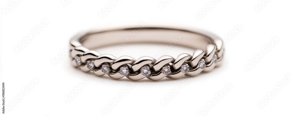 Chain-link ring with tiny gems, combining edgy and glamorous elements Chain-link ring with tiny gems, combining edgy and glamorous elements