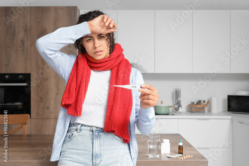 Sick African-American woman...