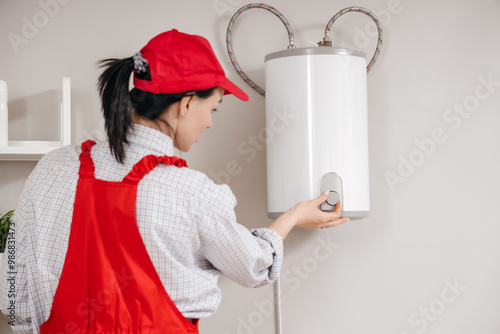 Female worker adjusting mod...