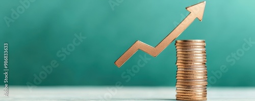 Investment growth concept with coins and an upward arrow on a textured background.
