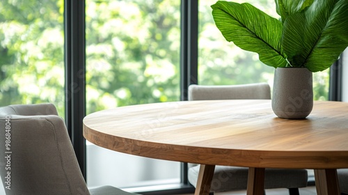 Modern wooden table with green plant decor