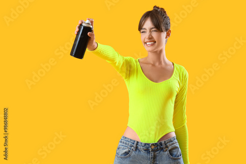 Cool young girl with spray ...