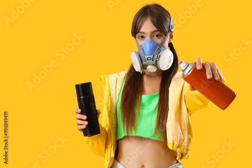 Young girl in respirator an...