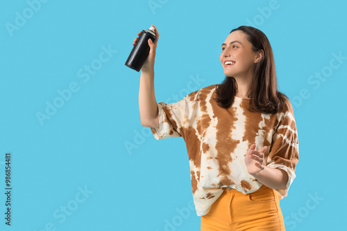 Young woman with spray pain...