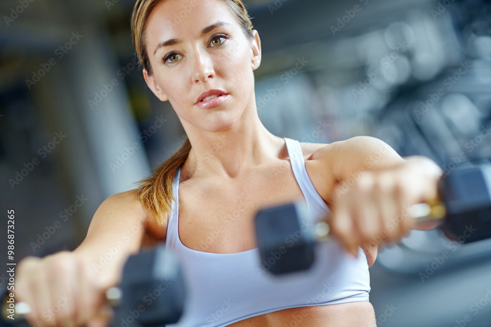 Dumbbell, exercise and weightlifting with woman in gym for workout, performance and fitness. Weights, strong and sports athlete with person training and muscle for energy, wellness and health Dumbbell, exercise and weightlifting with woman in gym for workout, performance and fitness. Weights, strong and sports athlete with person training and muscle for energy, wellness and health