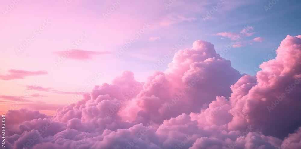 Beautiful pink cloudscape illuminating the sky at sunset Beautiful pink cloudscape illuminating the sky at sunset