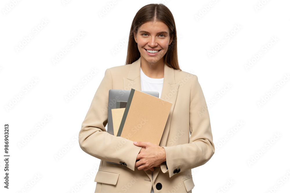 Portrait of millennial woman teacher holding copy books and laptop in hands Portrait of millennial woman teacher holding copy books and laptop in hands
