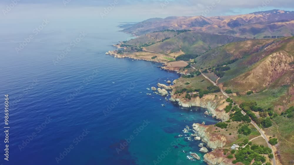 Aerial view of Pacific Ocean coastline along Highway 1 in California. Big Sur, Bixby Bridge, Lucia. Travel concept, tourism, travel, vacation. 4K video. Aerial view of Pacific Ocean coastline along Highway 1 in California. Big Sur, Bixby Bridge, Lucia. Travel concept, tourism, travel, vacation. 4K video.