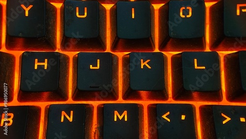 Mechanical gaming keyboard with backlight, close-up. Gaming keyboard with RGB backlight.