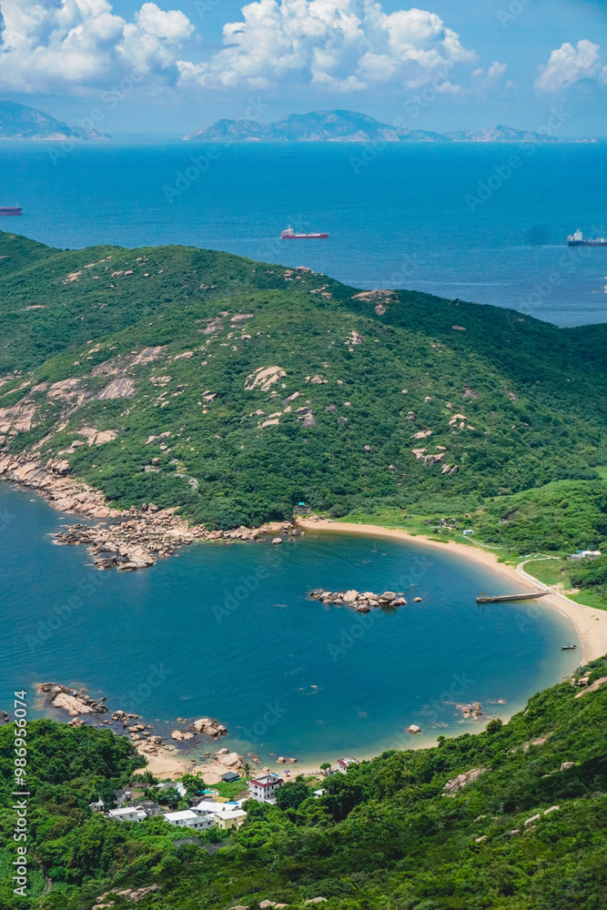 Fototapeta premium A beautiful scenery from Lamma Island hiking trails from Sok Kwu Wan and ling kok shan overlook the shoreline in the deep ocean blue