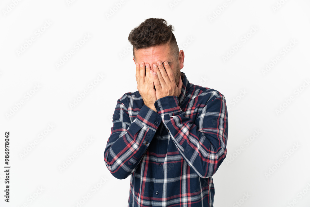 Caucasian man isolated on white background covering eyes by hands Caucasian man isolated on white background covering eyes by hands