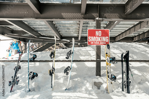 Snowboards leaned against a railing at Monarch Mountain resort