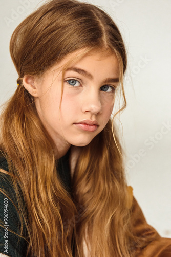 Portrait of a beautiful 7 years old girl. Close-up, studio. photo