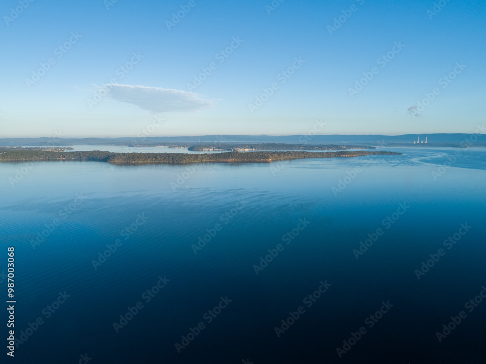 Shoreline of Lake Macquarie on cool morning seen from aerial view Shoreline of Lake Macquarie on cool morning seen from aerial view