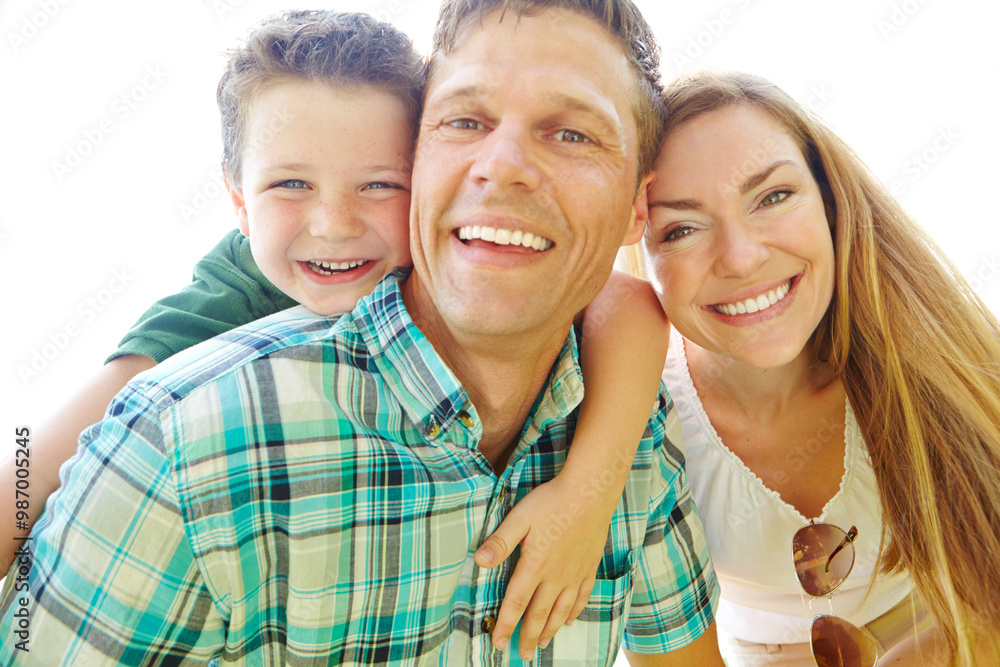 Hug, care and child with parents, portrait and peace in park, love and bonding of family. Embrace, mom and dad with kids, relax and break in weekend, woman and man with youth, happy and together