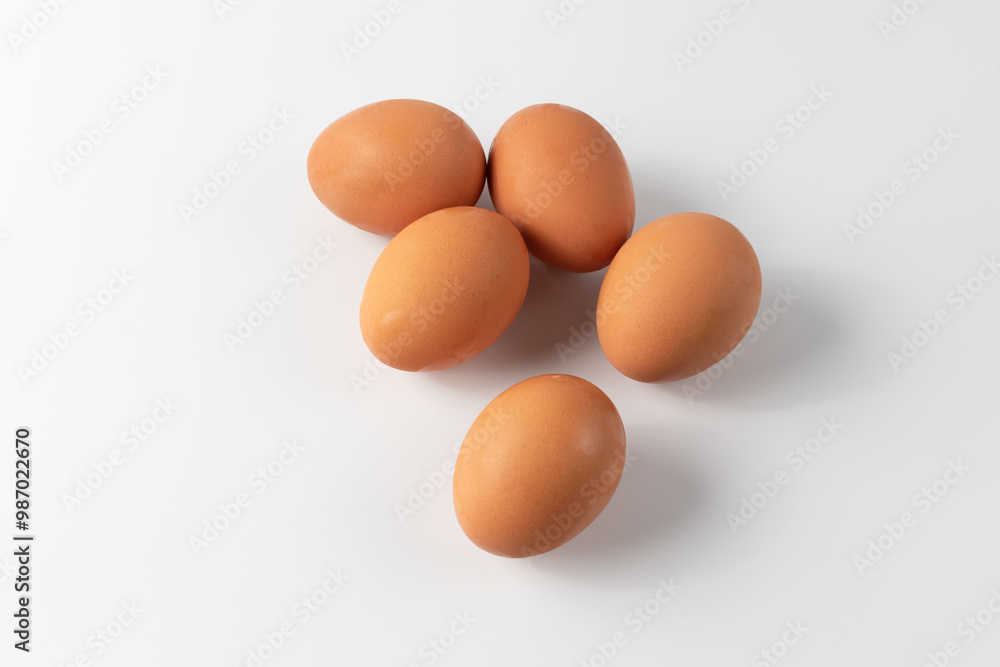 Fresh Chicken Eggs, close-up of eggs on white. Fresh Chicken Eggs, close-up of eggs on white.