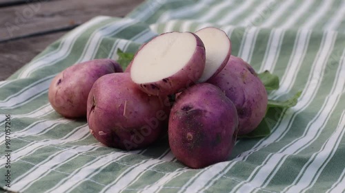 organic potatoes close up on striped cloth