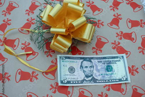 dollar bill on a present packet