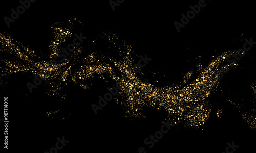 Scattered golden particles on dark background. Holiday background or design element. New Year and Christmas