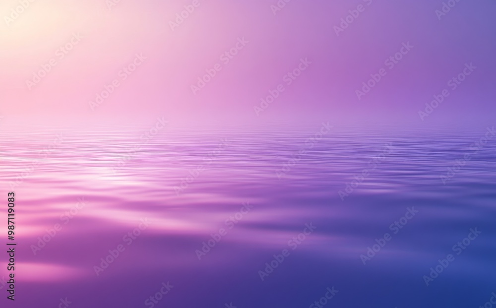 Soft pink and purple hues reflecting on calm water surface. Soft pink and purple hues reflecting on calm water surface.