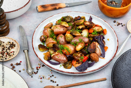 Photos Roasted vegetable medley including potatoes brussels sprout.