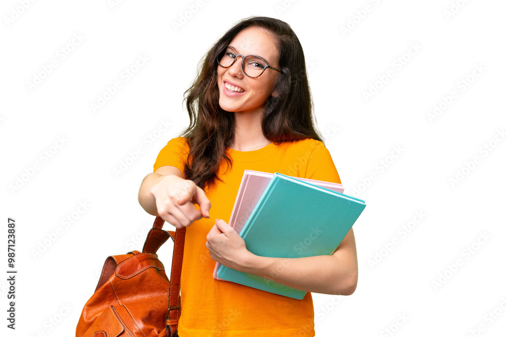 Young student caucasian woman over isolated background pointing front with happy expression